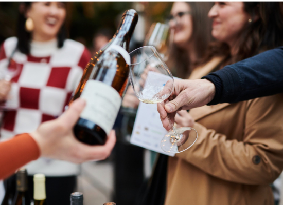 Sommeliers taste-testing wine at La Paulée Burgundy Festival