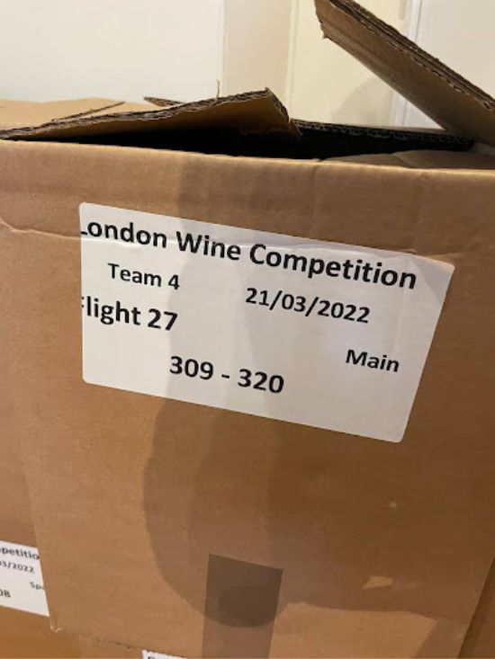 Each box is marked with a flight number and a tasting order number