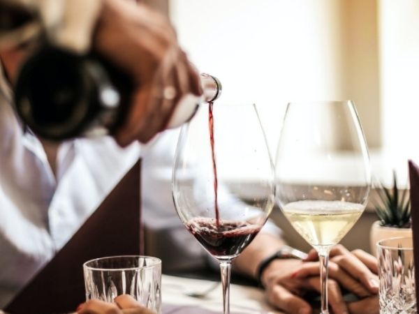 Sommelier pouring wine